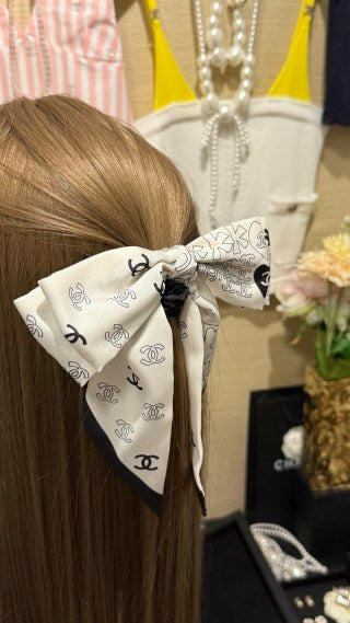 Chanel Double-Sided Bow Hair Tie with Heart and Four-Leaf Clover Motifs