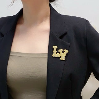 Louis Vuitton Crystal Monogram Letter Brooch