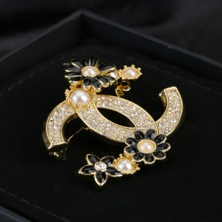 CHANEL Arabella Noir Floral Emblem Brooch